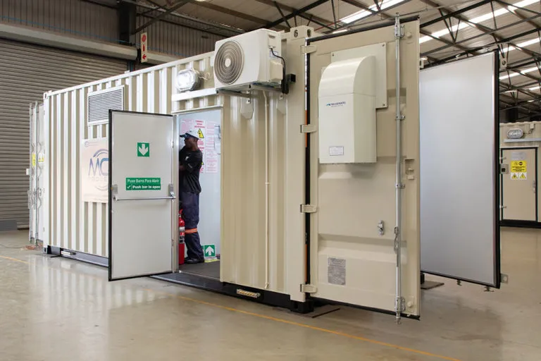 Modular substation containing cast resin transformer and associated switchgear.